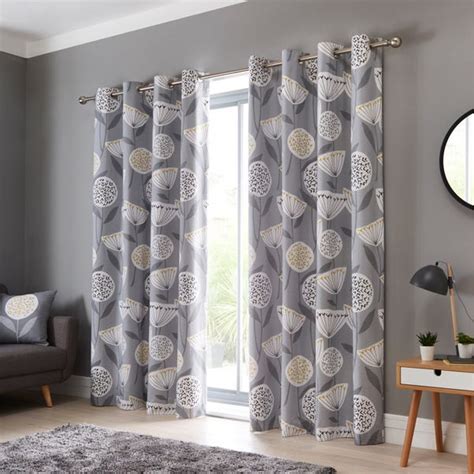 Elements Emmott Grey Blackout Eyelet Curtains | Dunelm