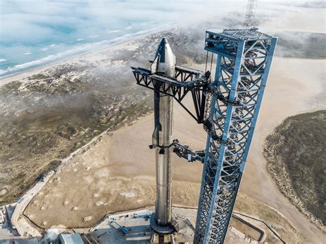 Epic Photos Show SpaceX Starship Beaming on the Launchpad - CNET