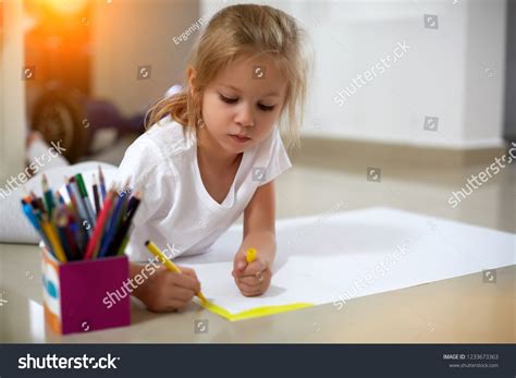 Adorable Little Girl Lying On Floor Stock Photo 1233673363 | Shutterstock