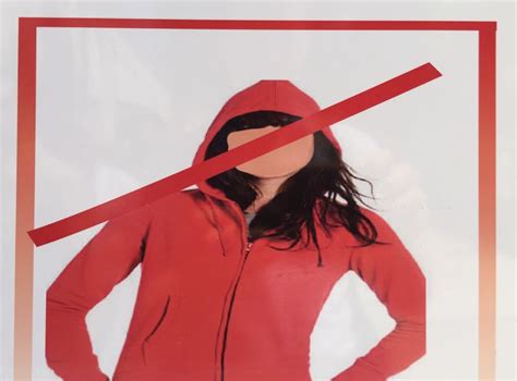 No hoodies allowed! Or at least red hoodies ... on women ...