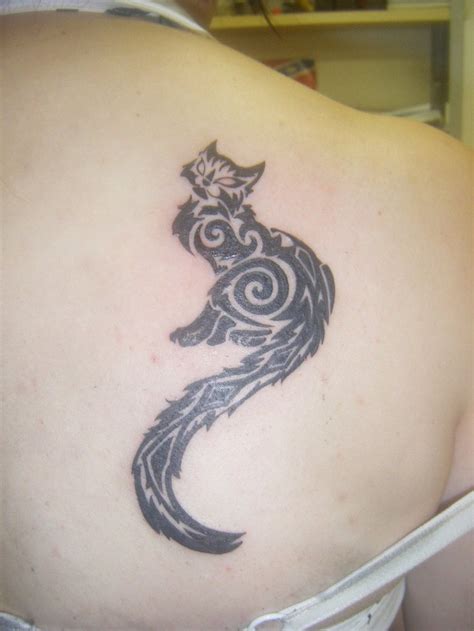 10 Awesome Tribal Cat Tattoos