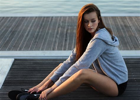 girl-in-gray-hoodie-sitting-on-the-dock image - Free stock photo ...