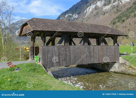 Old Covered Wooden Bridge at Wolfenschiessen on the Swiss Alps Stock Photo - Image of wood ...