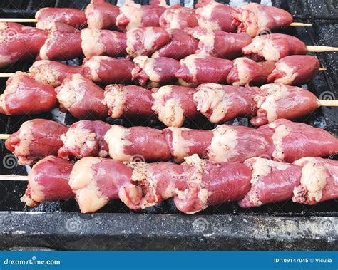 Skewers with Raw Chicken Hearts on the Grill Stock Image - Image of ...