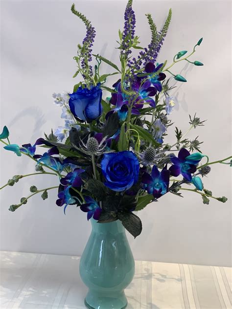 Teal, Blue Floral arrangement. W663 by Fillmore Florist San Francisco