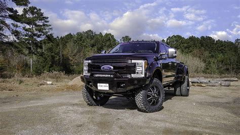 FORD BLACK WIDOW LIFTED TRUCKS — SCA Performance | Black Widow Lifted Trucks