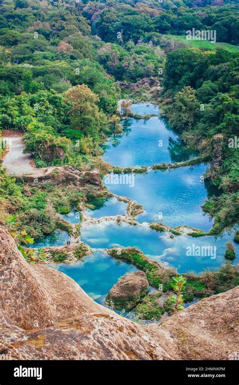 Natural water pools of the waterfall Salto del Agua - El Naranjo - San ...