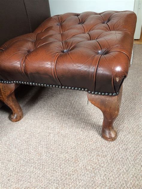 Brown leather footstool