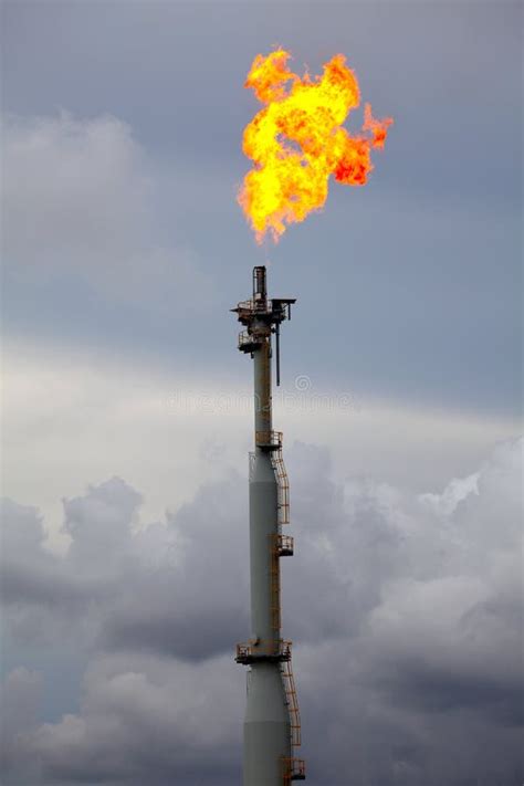 Flare Burning Gas At Refinery Plant Stock Photos - Image: 20055843