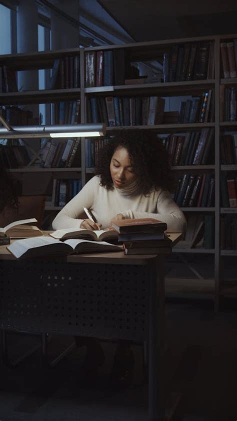 College Students Researching and Reading at the Library · Free Stock Video