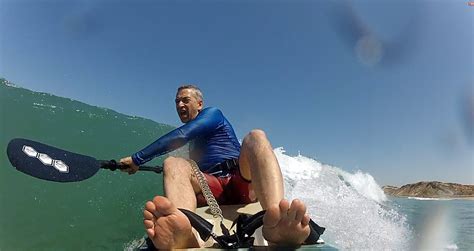 Surfing in Tel Aviv, Isreal. Small waves but fun enough to play with a ...