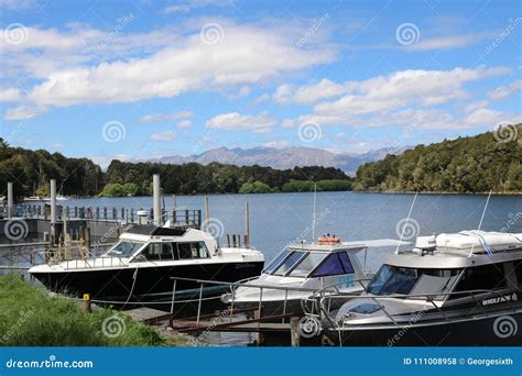 Boats on Waiau River Pearl Harbour Manapouri NZ Editorial Stock Photo - Image of boats, vessel ...