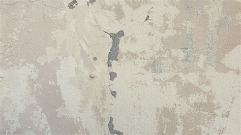 Photo of a Cement Wall with Cracks · Free Stock Photo