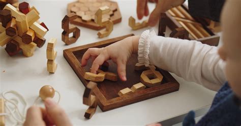A Child Playing with Wooden Toys · Free Stock Video