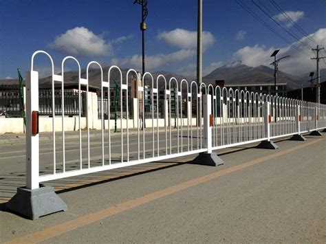 Bow-Top Road Fence Is Installed Within Medians of Divided Driveways