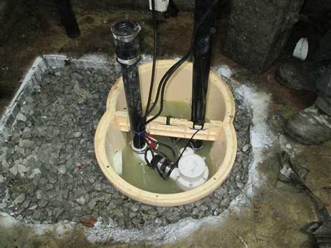 Sump Pump Installation - Sump pump systems in Boisbriand, Quebec - Installation of the ...