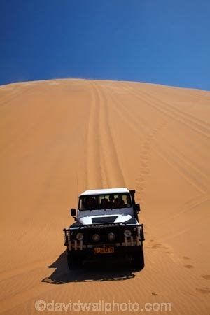 Four wheel drive descending a huge sand dune on a Sandwich Harbour 4x4 ...