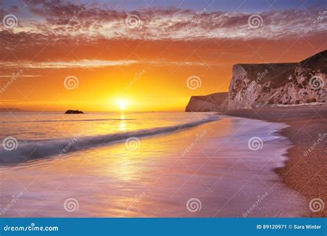 Cliffs at Durdle Door Beach in Southern England at Sunset Stock Image ...