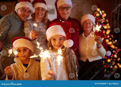 Happy Family with Sparklers Celebrate Christmas Stock Photo - Image of ...