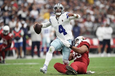 Cowboys' Dak Prescott Underwhelms as Cardinals get First Win