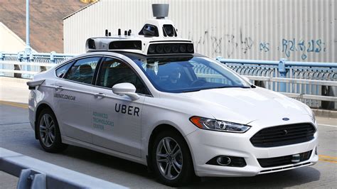 Uber launches first self-driving taxi fleet in US