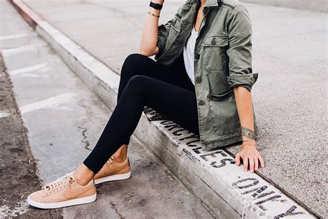 Woman Wearing Nordstrom Green Utility Jacket White Tshirt Black Leggings Nike Sneakers B ...