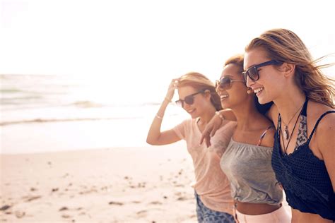 Girls Walking on a beach - Escott Orthodontics | Orlando & Lake County