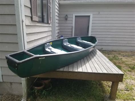 Coleman Scanoe Canoe Square back canoe with paddles and motor $550 obo or trade for tandem kayak ...