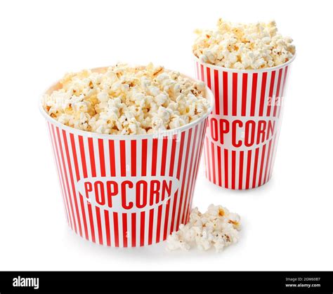 Cups with popcorn on white background Stock Photo - Alamy