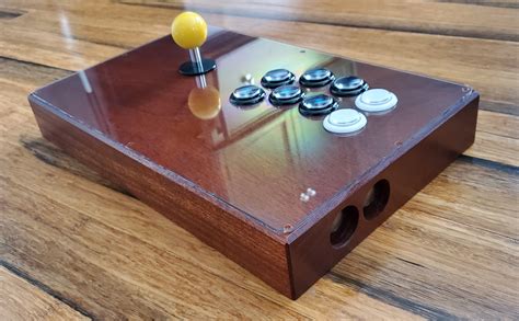 So, I make custom, one piece, solid wood arcade sticks.