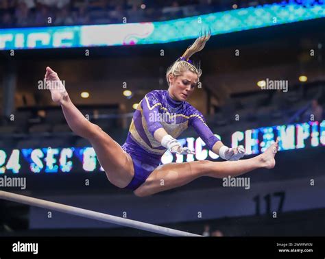 March 23, 2024: LSU's Olivia Dunne competes on the uneven parallel bars ...