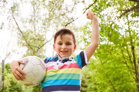 Winner celebrating success after soccer game at park Stock Photo ...