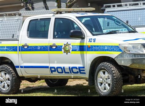 SAPS South African police service vehicle, van, truck parked at a crime scene concept law and ...