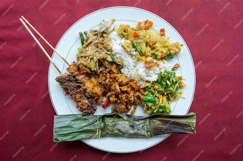 Premium Photo | A plate of indonesian vegtarian nasi campur indonesian ...