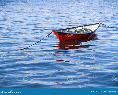 Small Boat in Vivid Water stock photo. Image of tied, vivid - 1778334