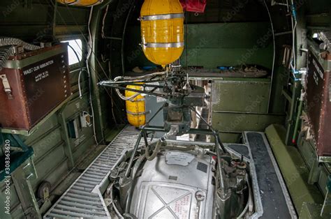 B-24 Liberator interior view of Ball Turret mount with yellow oxygen tanks and ammo cans. Stock ...