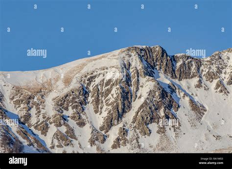 Mountain panorama with snowy peaks Stock Photo - Alamy