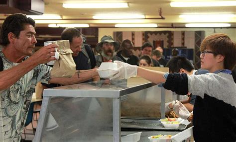 Volunteer and charity club serves food at homeless shelter – The Channels