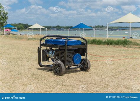 Portable Gasoline Power Generator and High Peak Frame Tent Stock Photo ...