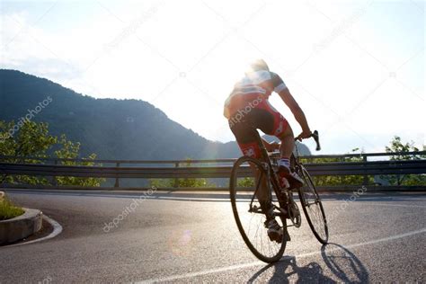 Mountain road cyclist Stock Photo by ©rcaucino 87995574