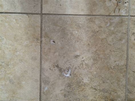 flooring - What to use to fill holes in floor tile in kitchen - Home ...