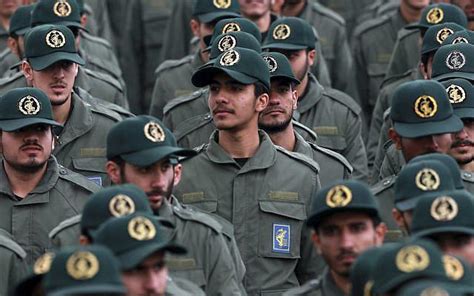 Iranian lawmakers wear IRGC uniforms and chant "Death to America"