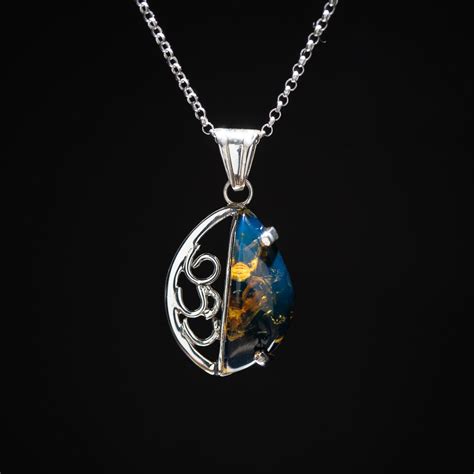 Blue Amber Pendants - Larimar Creations