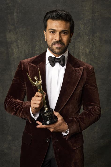 Ram Charan: Ram Charan poses with the Spotlight Award at..