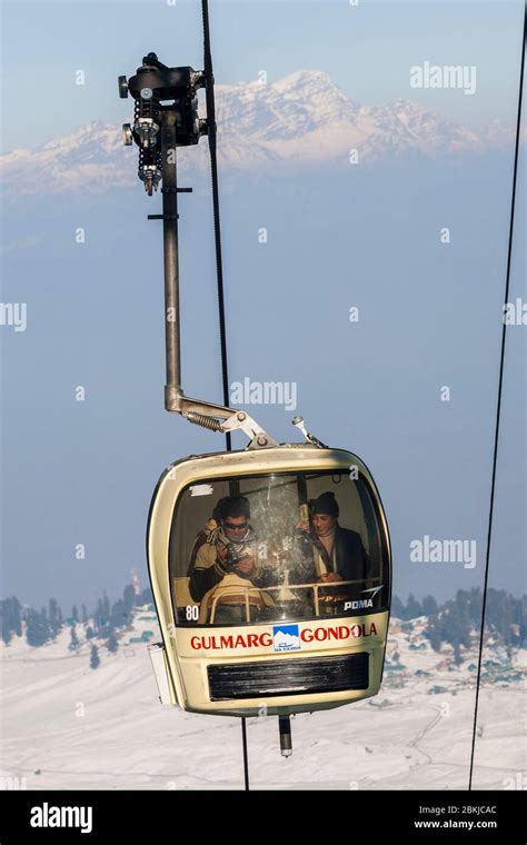 India, Jammu and Kashmir, Gulmarg, indian tourists couple in Gondola ...