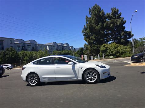 New close encounter spy shots of the White Tesla Model 3