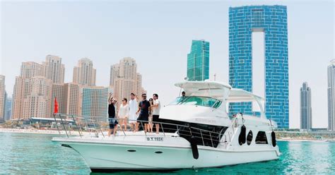 Dubai: Marina Sightseeing Cruise with Ain Wheel View | GetYourGuide