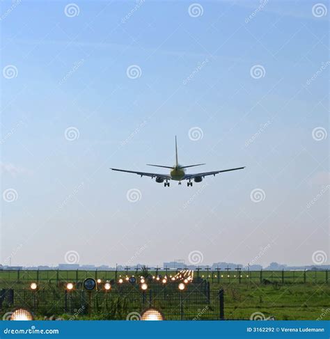 Airplane Landing at Airport Stock Photo - Image of plane, closeup: 3162292