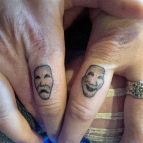 Comedy and tragedy mask matching tattoos.