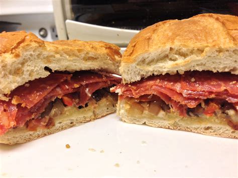 Pepperoni sandwich with cheddar and Gruyere cheese, chopped mushrooms and onions sauteed in ...